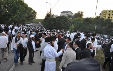 В Умани паломники побили мужчину и видеооператора